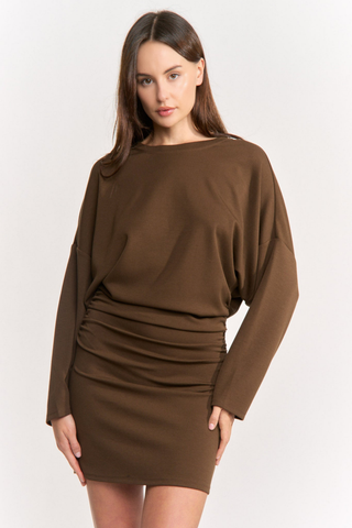 En Saison Jane Mini Dress in Brown featuring a long-sleeve jersey knit bodice, cinched waist, and fitted mini skirt.