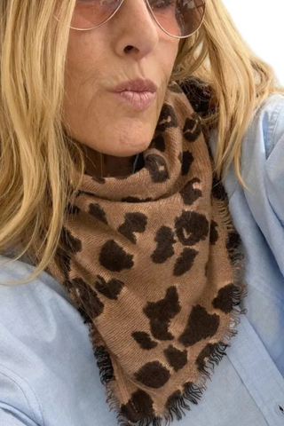 Kerri Rosenthal Cashmere Cheetah Bandana in Multi featuring a brown and black cheetah print on featherweight cashmere with fringe edging.