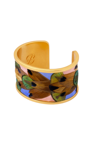 Brackish Shannon Wide Cuff bracelet with handcrafted feather detailing in champagne, sky blue, gold, and green tones with matte gold finish
