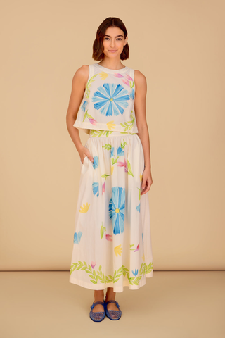 Sleeveless floral crop top with blue and pink painted print paired with matching midi skirt
