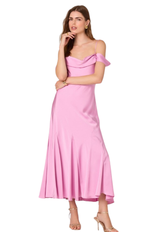Woman wearing a pink off-the-shoulder midi dress with draped neckline and flowy skirt from ASTR on a white background.