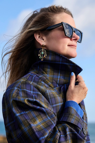 Mignonne Gavigan Vista Earrings in Gold Multi featuring green agate and brown tiger's eye stones in a cascading gold-tone silhouette.