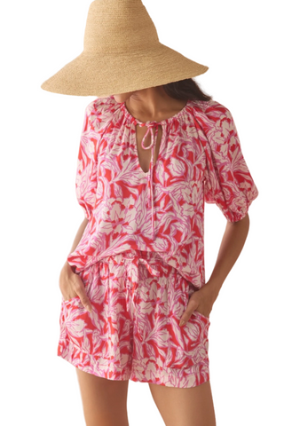 Omika Isla blouse in pink and red Johanna Persimmon floral print with tie neckline and puff sleeves