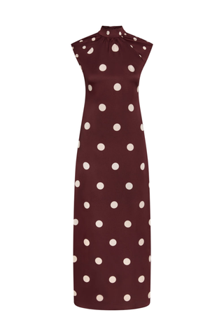 Misa Runi Dress in Polka Dots Mix featuring burgundy satin with oversized cream polka dots, a gathered high neckline, and a contrasting tie-back sash.
