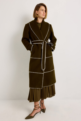 Chloe Coat in Juniper Green featuring a long wool wrap silhouette, oversized shawl collar, contrast stitching, and self-tie belt.