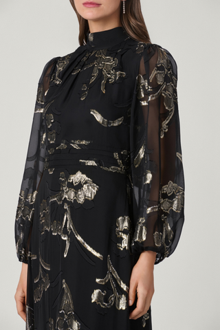 Shoshanna Langdon Dress in Jet/Gold featuring shimmering black and gold lurex chiffon, long balloon sleeves, and an asymmetrical tiered skirt.