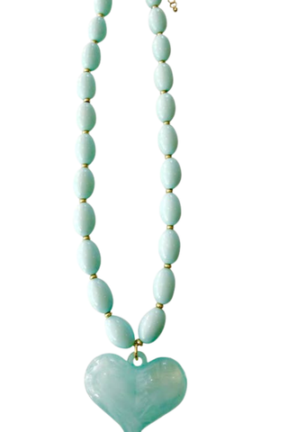 Gemelli Roxie Beaded Necklace in Light Blue with glossy pale blue beads and oversized heart pendant.