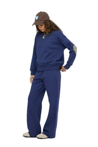 Kerri Rosenthal Ex-Boyfriend Sweatshirt in indigo blue featuring contrast heart elbow patches and a relaxed cotton fleece silhouette.