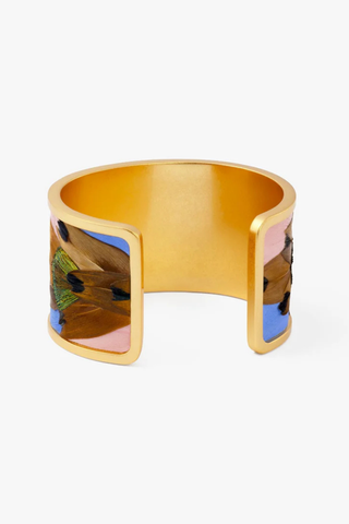 Brackish Shannon Wide Cuff bracelet with handcrafted feather detailing in champagne, sky blue, gold, and green tones with matte gold finish