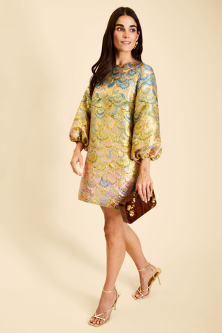 Mestiza Rosanna Mini Dress in Gilded Marble featuring a gold-toned jacquard pattern, A-line mini silhouette, and three-quarter balloon sleeves.
