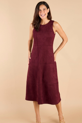 Jude Connally Blake Faux Suede Dress in Merlot featuring a sleeveless fit-and-flare midi silhouette with contrast stitching.