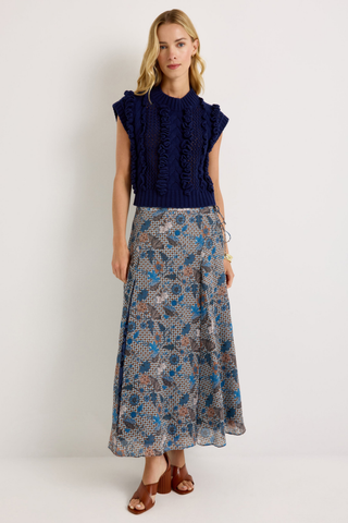 Gracen Skirt in Aegean featuring a blue and brown printed maxi silhouette with lace panel detailing and a flowing hem.