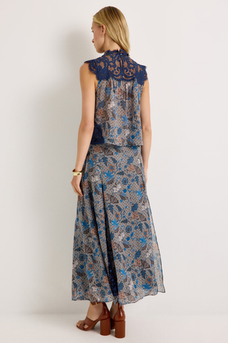 Gracen Skirt in Aegean featuring a blue and brown printed maxi silhouette with lace panel detailing and a flowing hem.