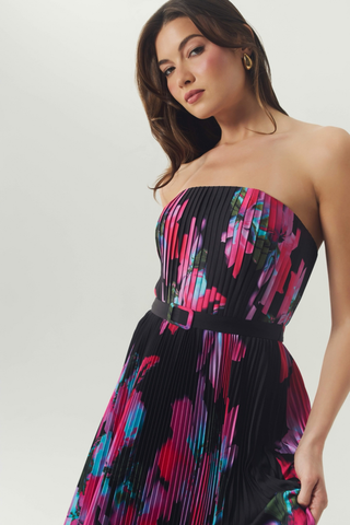 Hutch Merrick Dress in black and pink featuring a strapless bodice, vibrant floral print, and flowing maxi skirt.