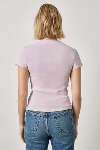 Freesia wash ribbed cap sleeve V-neck fitted tee by Lilla P worn with denim