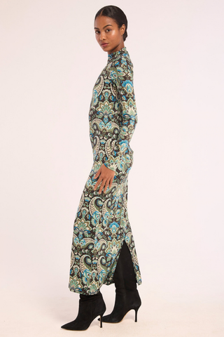 Misa Mitra Dress in Reflective Chintz featuring an ornate teal printed stretch jersey, fitted long sleeves, and bodycon maxi silhouette.