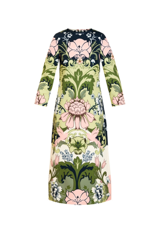 Mestiza Consuela Midi Dress in Eventide Gardens featuring a colorful botanical floral print, long sleeves, and a tailored midi silhouette.