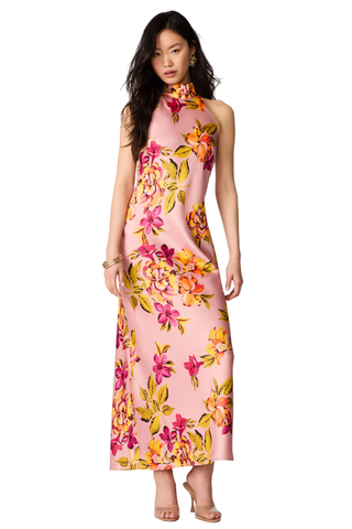 Steve Madden Lara Dress in Tropical Breeze featuring a pink satin floral print, halter neckline, tie-back detail, and maxi silhouette