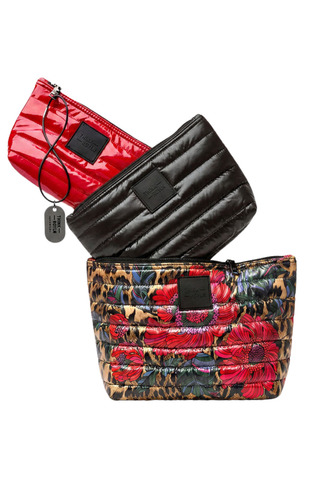 Think Royln Travel Trio set of three quilted pouches in leopard floral, black, and red.