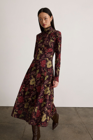 Tanya Taylor Thea Dress in Dark Fig Multi featuring a long-sleeve floral maxi silhouette in rich burgundy, green, and pink tones.