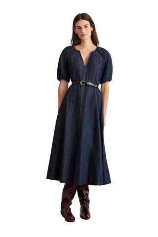 Tanya Taylor Piper Dress in Midnight Rinse dark indigo denim with short puff sleeves and a fit-and-flare midi silhouette.