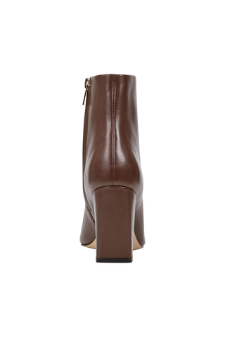 Marc Fisher LTD Yanara Bootie in dark brown leather featuring a square toe, high block heel, and sleek ankle silhouette.