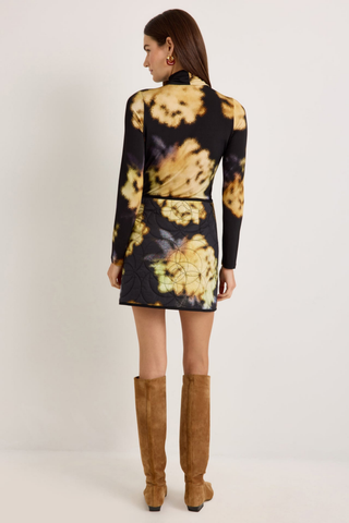 Marie Oliver Eloise Top in Lush featuring a black and yellow abstract floral print, fitted long sleeves, and sleek turtleneck silhouette.