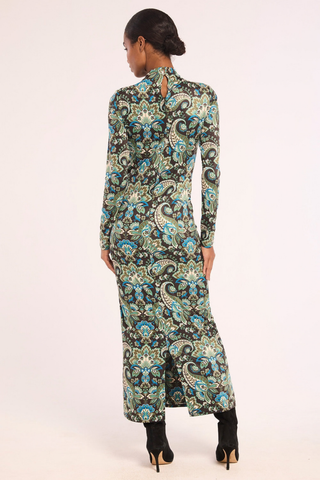 Misa Mitra Dress in Reflective Chintz featuring an ornate teal printed stretch jersey, fitted long sleeves, and bodycon maxi silhouette.