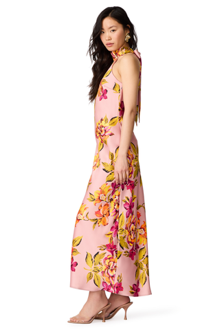 Steve Madden Lara Dress in Tropical Breeze featuring a pink satin floral print, halter neckline, tie-back detail, and maxi silhouette