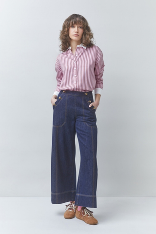 Suncoo Lake Blouse in Rose featuring pink stripes, a pointed collar, button front, long sleeves, and contrast white cuffs.