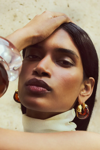 Lizzie Fortunato Organic Hoop earrings featuring gold-plated brass hoops with translucent resin accents