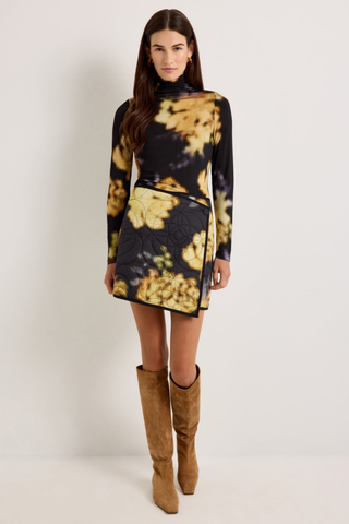 Marie Oliver Eloise Top in Lush featuring a black and yellow abstract floral print, fitted long sleeves, and sleek turtleneck silhouette.
