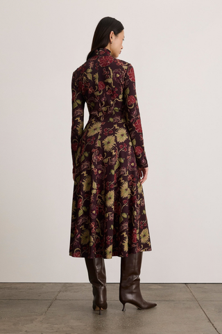 Tanya Taylor Thea Dress in Dark Fig Multi featuring a long-sleeve floral maxi silhouette in rich burgundy, green, and pink tones.
