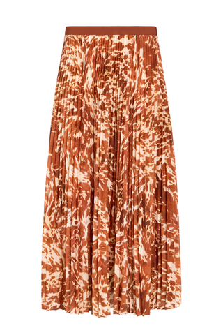 Wesley Skirt in Calico featuring a red and ivory printed pleated maxi silhouette with a contrasting auburn waistband.
