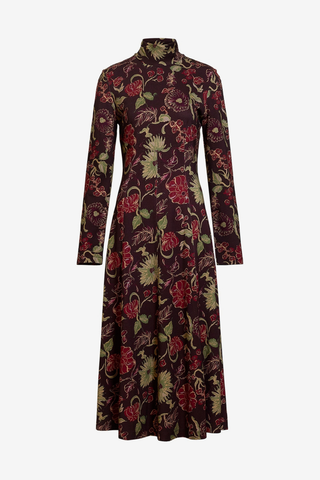 Tanya Taylor Thea Dress in Dark Fig Multi featuring a long-sleeve floral maxi silhouette in rich burgundy, green, and pink tones.