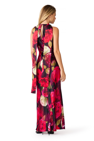Steve Madden Jaiden Dress in Deco Rose featuring a pink and red floral satin print, halter scarf neckline, cutaway shoulders, and maxi silhouette.