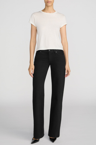 FRAME The Gray Jean in Black featuring a low-rise waist, relaxed fit, full-length leg, and wide bootcut silhouette.