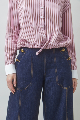 Suncoo Lake Blouse in Rose featuring pink stripes, a pointed collar, button front, long sleeves, and contrast white cuffs.