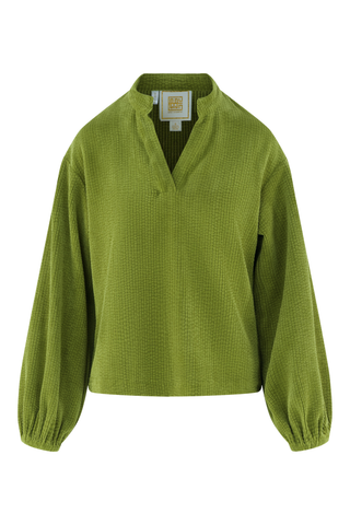Emily McCarthy Lolli Top in Cardamom green featuring an open neckline, long voluminous sleeves, gathered cuffs, and relaxed fit.