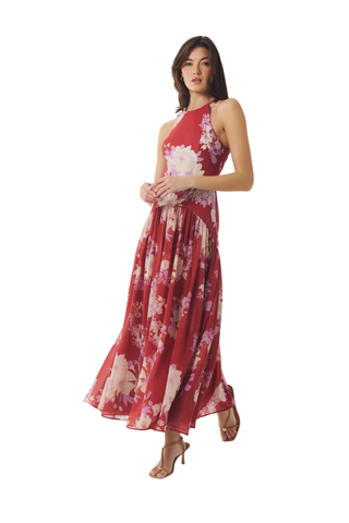 Red and ivory floral sleeveless maxi dress with a flowing skirt.
