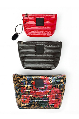 Think Royln Travel Trio set of three quilted pouches in leopard floral, black, and red.