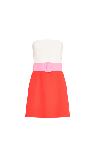 Amanda Uprichard Fae Romper in ivory and crimson strapless color-block design with wide belt and A-line silhouette