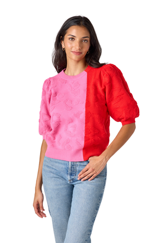Crosby Smith Sweater in Crosby Colorblock featuring a pink and red colorblock design, crew neckline, and short puff sleeves.