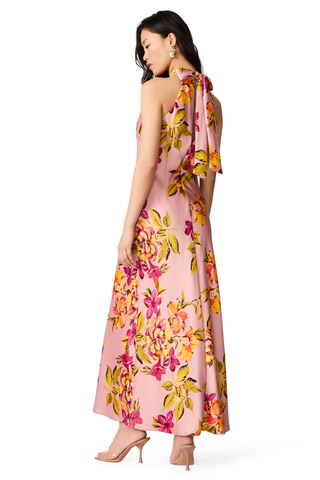 Steve Madden Lara Dress in Tropical Breeze featuring a pink satin floral print, halter neckline, tie-back detail, and maxi silhouette