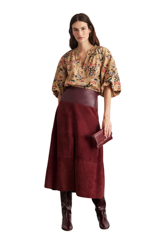 Tanya Taylor Combo Hudson Skirt in Deep Redwood featuring a burgundy suede A-line silhouette with a contrasting leather waistband and front slit.
