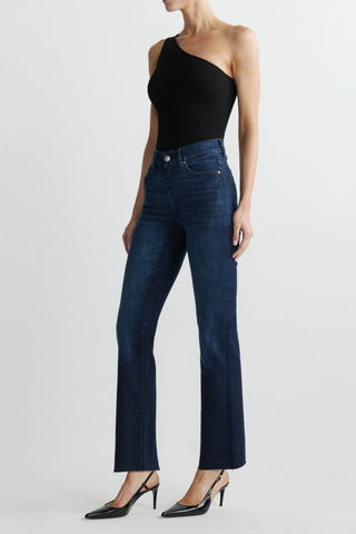 DL1961 Halle Straight Jean in Mediterranean featuring a high-rise straight-leg silhouette in a beige-tinted dark indigo wash.