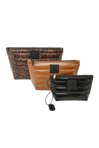 Think Royln Travel Trio set of three quilted pouches in Neo Python print, cocoa brown, and black.