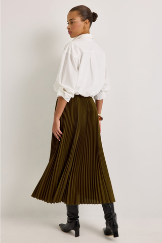 Marie Oliver Wesley Skirt in Juniper Green featuring a pleated A-line maxi silhouette and contrasting black waistband.