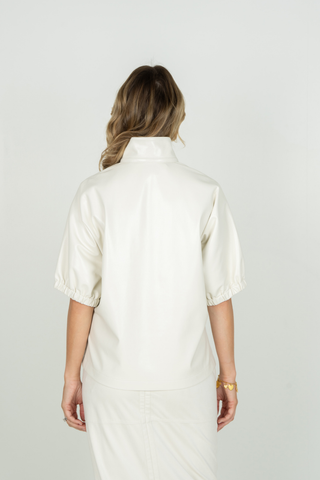 Emily McCarthy Poppy Top in Carrara white featuring a collared V-neckline, short gathered puff sleeves, and relaxed silhouette.