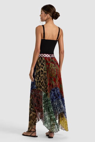 Alice + Olivia Katz Midi Skirt in Off The Grid multicolor print with a contrasting waistband and flowing asymmetrical hem.
